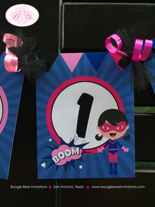 Pink Supergirl I am 1 Highchair Banner Party Super Girl Superhero Pink Navy Blue Cityscape Pow Wham 1st Boogie Bear Invitations Dinah Theme